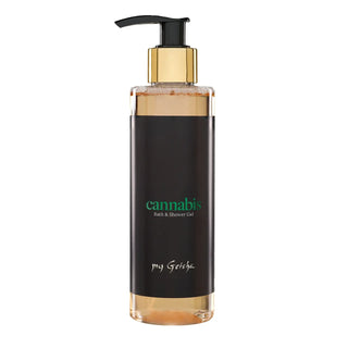 Bottle of my Geisha Cannabis bath and shower gel with gold pump on a white background