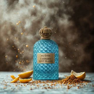 Blue bottle labeled 'Cannabis Lost Island' with lemon slices and brown spices on a textured surface.