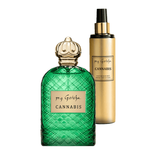 A perfume bottle with a green, faceted glass body and a gold, ornate cap alongside a gold spray bottle labeled 'CANNABIS', both with 'my Geisha' branding.