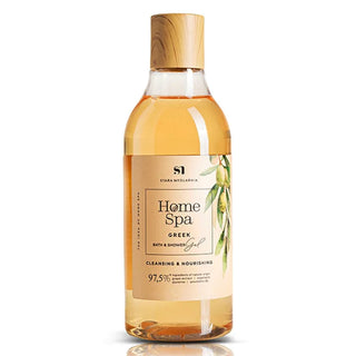 A clear bottle of Greek Bath & Shower Gel with a wooden cap, labeled 'Home Spa', against a white background.