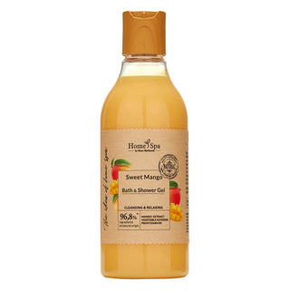 A bottle of Sweet Mango Bath and Shower Gel with a creamy yellow liquid visible through the clear glass. The label displays 'HomeSpa' and the scent of Sweet Mango.