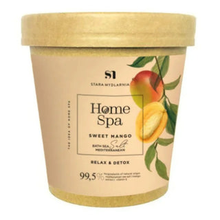 A container of Mango bath salt with a label that shows a mango and the text 'Home Spa Sweet Mango'.
