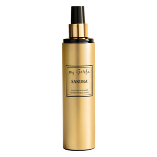 A gold-colored spray bottle labeled 'SAKURA' from the brand 'my Geisha'.