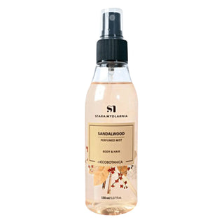 A clear spray bottle labeled 'Sandalwood' from Stara Mydlarnia by my Geisha, indicating it is a body and hair mist.