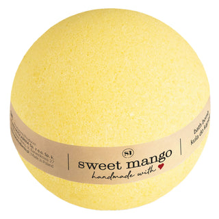 A yellow bath bomb with a label that reads 'sweet mango' from Stara Mydlarnia.